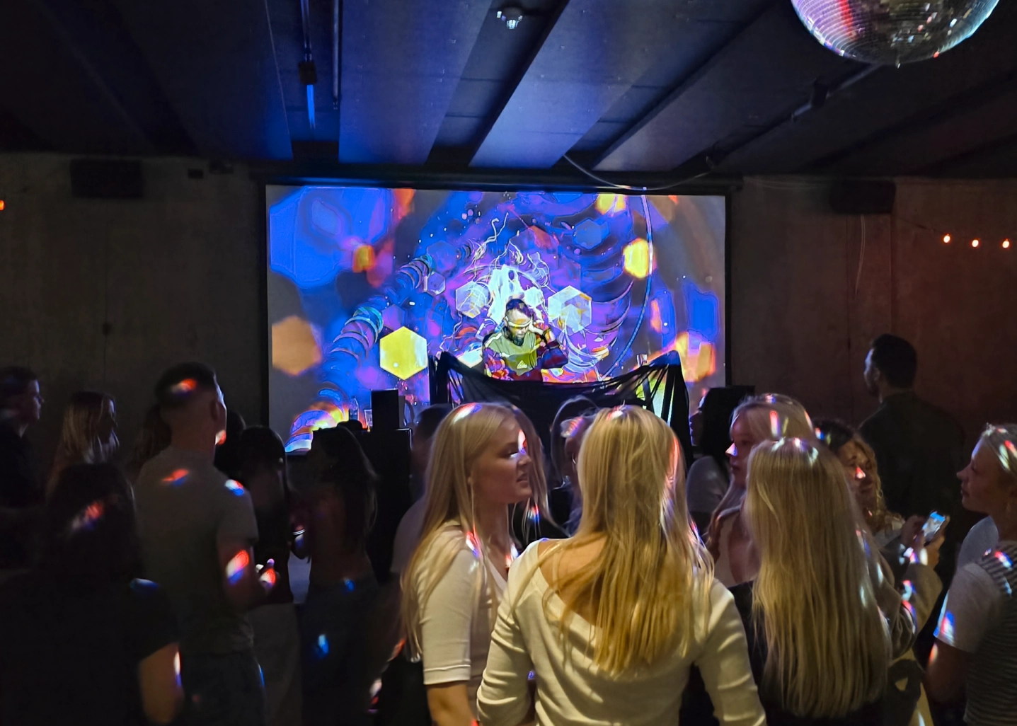 DJ playing for crowd at Nexthouse